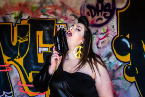 moschino bag h&m candom jeremy scott plus size grande taille blogger curvy girl leather dress eloquii peace earings